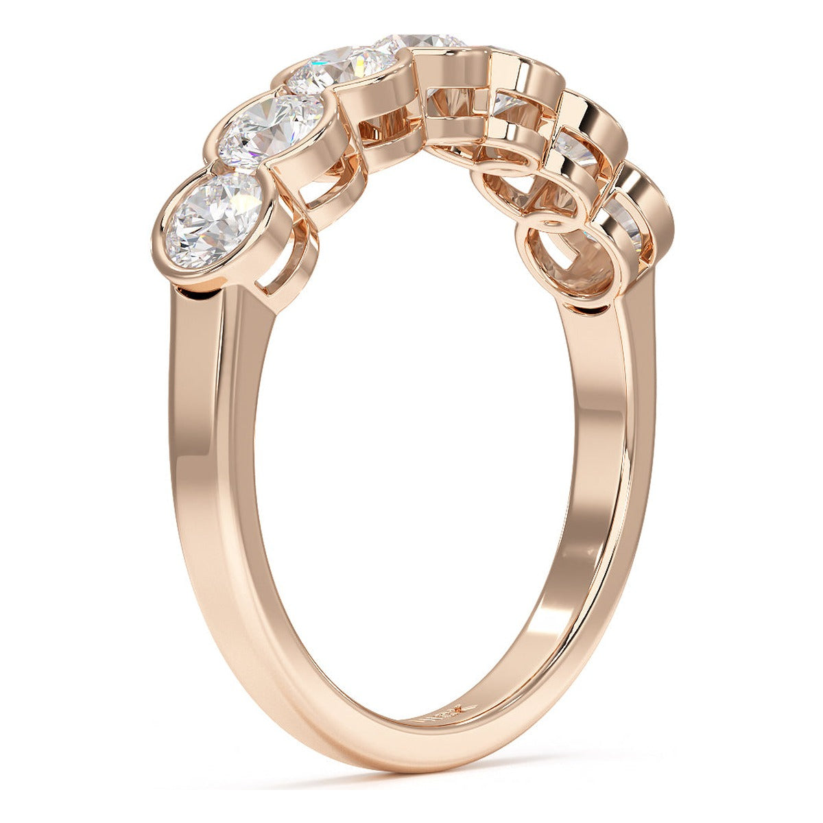 Round Cut Bezel Set Seven Stone Ring in rose gold, side view