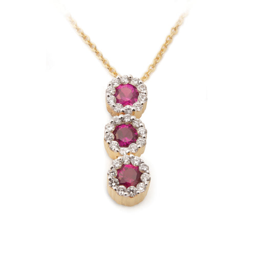A pendant featuring a graduated journey of brilliant red rubies, each encircled by delicate halos of sparkling diamonds.