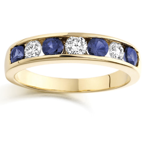 Wide Blue Sapphire Channel Set Half Eternity Ring in yellow gold