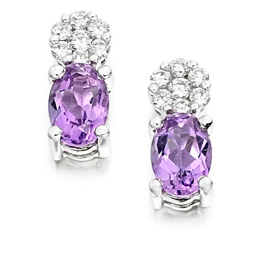 Amethyst &amp; Diamond Cluster Earrings. Featuring rich purple amethysts surrounded by shimmering diamonds in a refined cluster design.