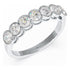 Round Cut Bezel Set Seven Stone Ring in white gold or platinum, perspective view