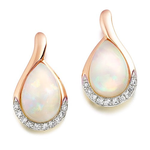 A pair of opal and diamond drop earrings with the opal gemstones at the centre and a halo of delicate diamonds around the edge, set in a rose gold.