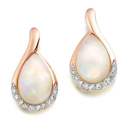 A pair of opal and diamond drop earrings with the opal gemstones at the centre and a halo of delicate diamonds around the edge, set in a rose gold.