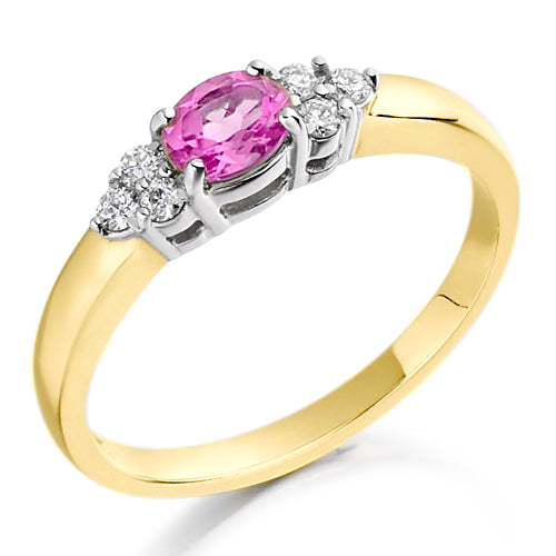 With its soft blush tones, the pink topaz is perfectly complemented by two brilliant diamonds in a classic trefoil design, creating a ring that’s both romantic and radiant.
