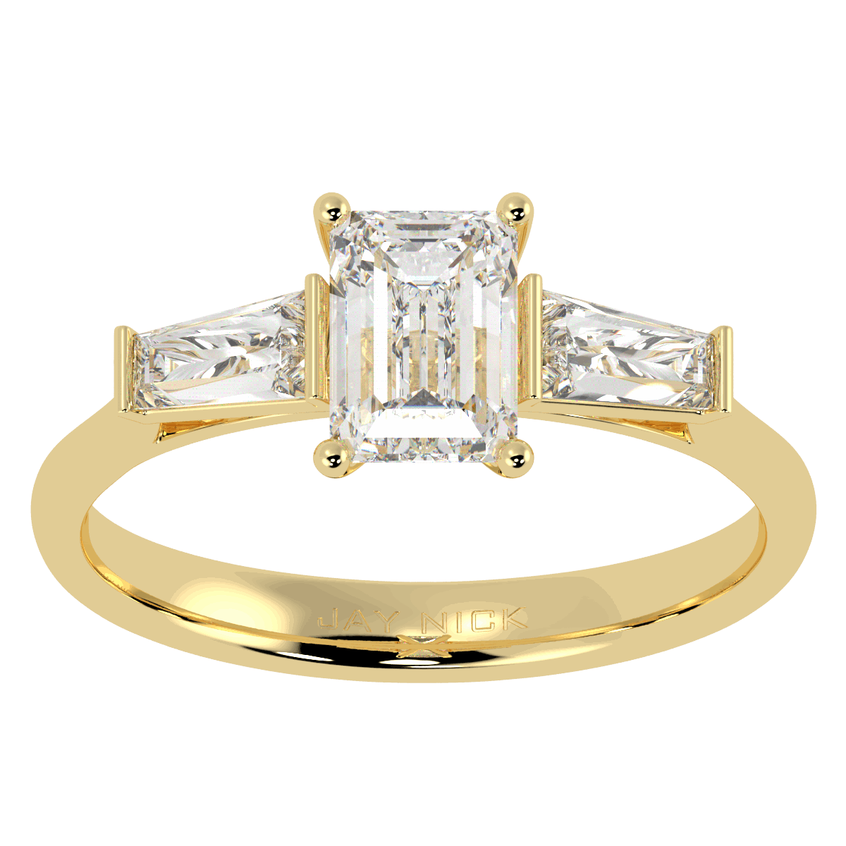 Emerald &amp; Baguette Three Stone Ring in yellow gold, top view
