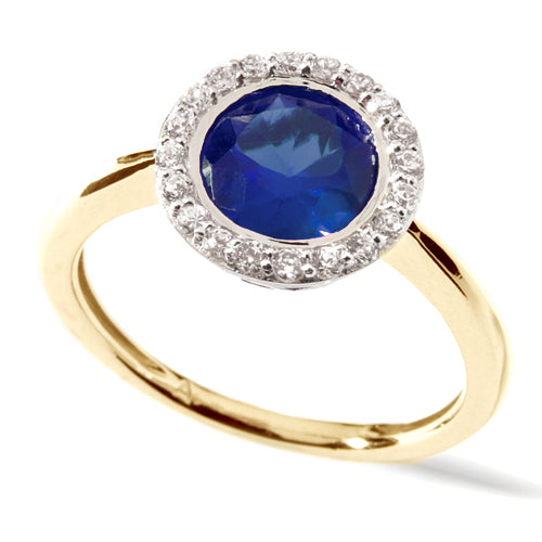 Round Blue Sapphire Halo Ring in yellow gold
