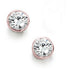 A pair of round solitaire earrings with a rubover setting, showcasing a single diamond in each earring.