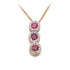 A pendant featuring a graduated journey of brilliant red rubies, each encircled by delicate halos of sparkling diamonds, suspended from a chain.