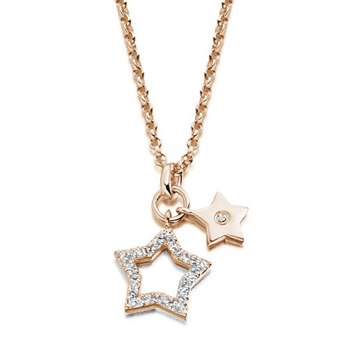 A diamond star pendant set in rose gold.