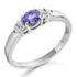Set in a charming trefoil design, three brilliant stones one central tanzanite flanked by sparkling diamonds create a graceful balance of colour and light.
