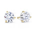 A pair of three claw solitaire earrings with round diamonds set in yellow gold.